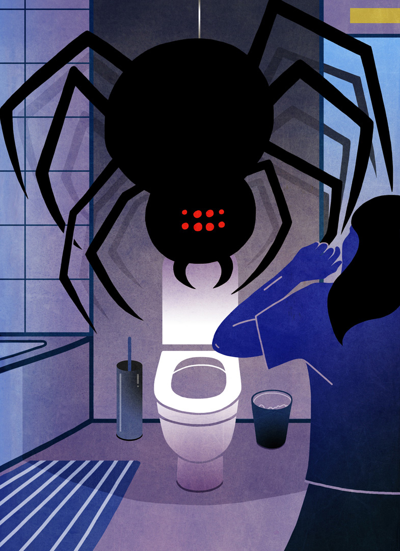 A woman surprised by a giant spider in a bathroom